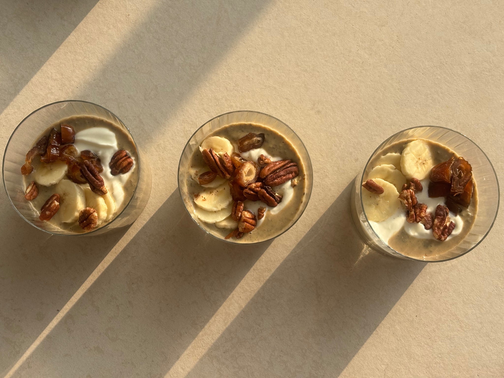 Three glass bowls with a LØUCO protein powder dessert for women to launch the LØUCO protein calculator.